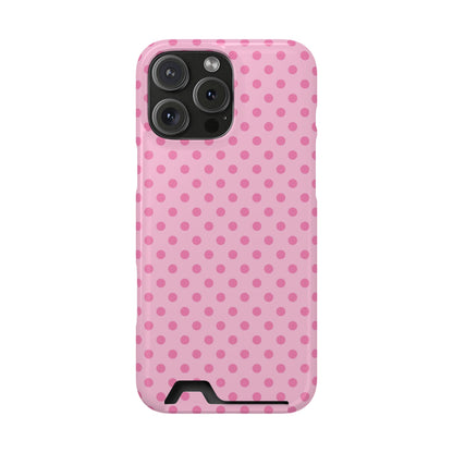 Pink polka dot phone case with a card in the slot