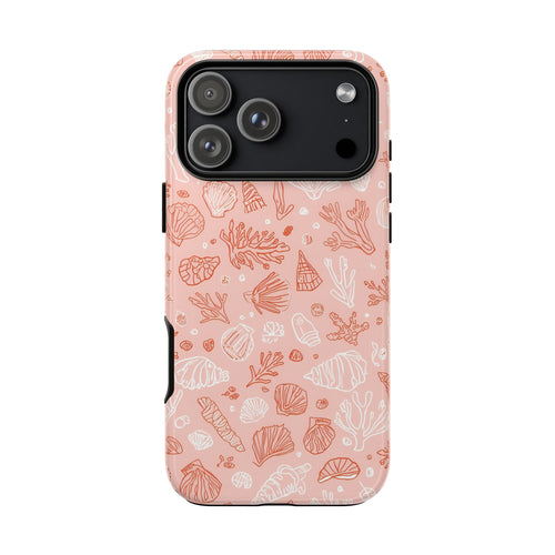 Pink seashell print tough phone case with white and coral shells on blush pink
