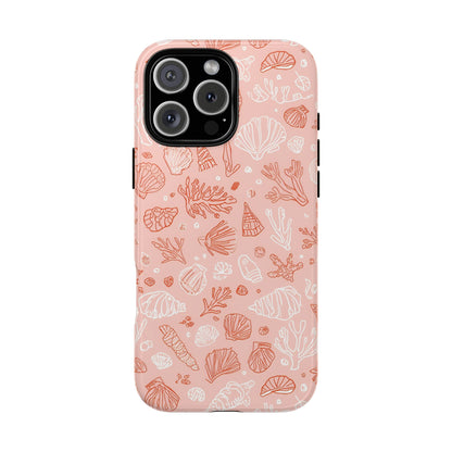 Pink seashell tough phone case held in hand