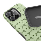 Sage green bow MagSafe iPhone case with olive hearts