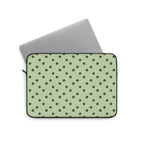 Sage green polka dot laptop sleeve, lifestyle view
