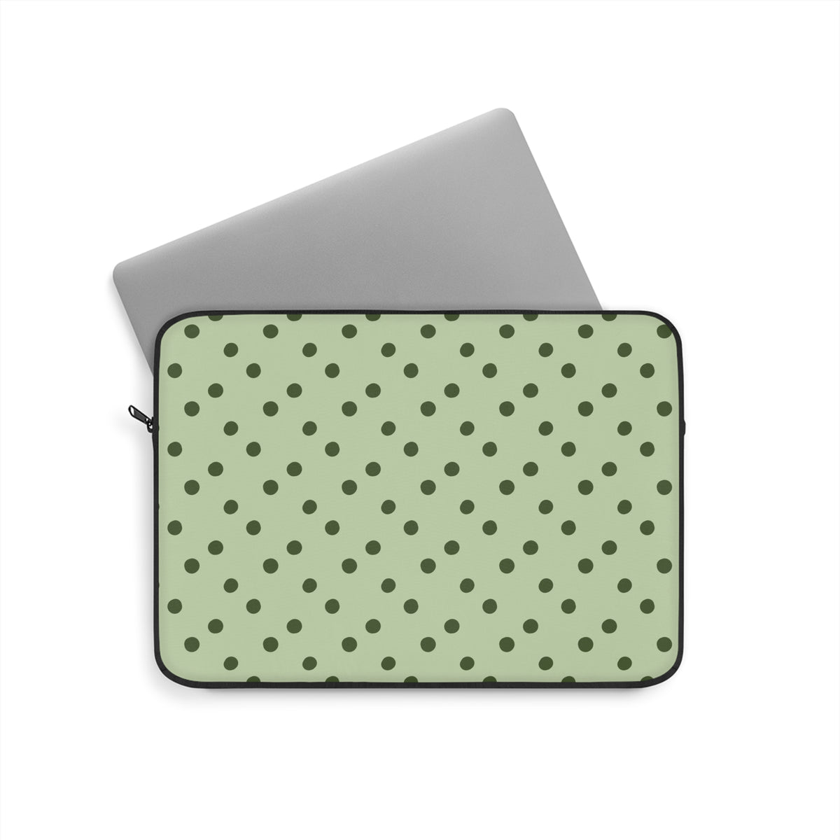 Sage green polka dot laptop sleeve, lifestyle view