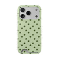 Sage green polka dot phone case with card holder, front view