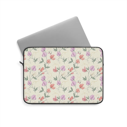 Floral laptop sleeve with a watercolor sweet pea print and black zip