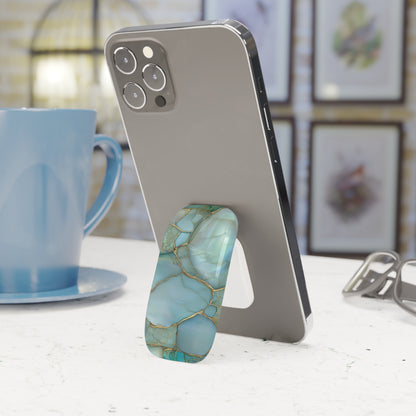 Teal marble phone grip attached to the back of a phone
