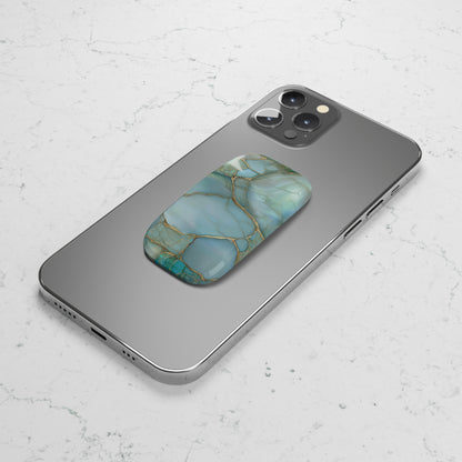 Teal marble phone grip folded out as a kickstand