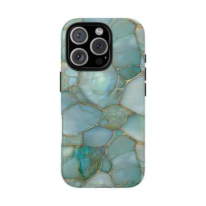 Teal marble tough phone case held in hand, ochre veined aqua pattern