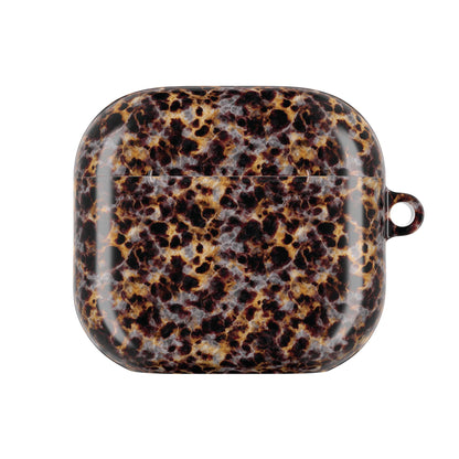 Mottled tortoiseshell pattern detail on an AirPod case