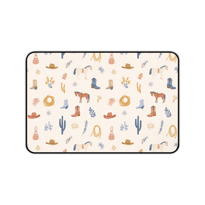 Cowgirl desk mat with dusty blue florals and mustard wildflowers on a desk