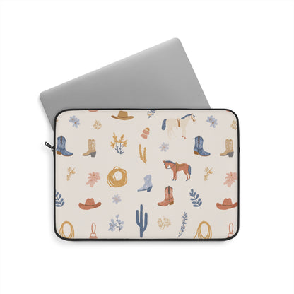 Cowgirl laptop sleeve with black YKK zipper and dusty blue florals